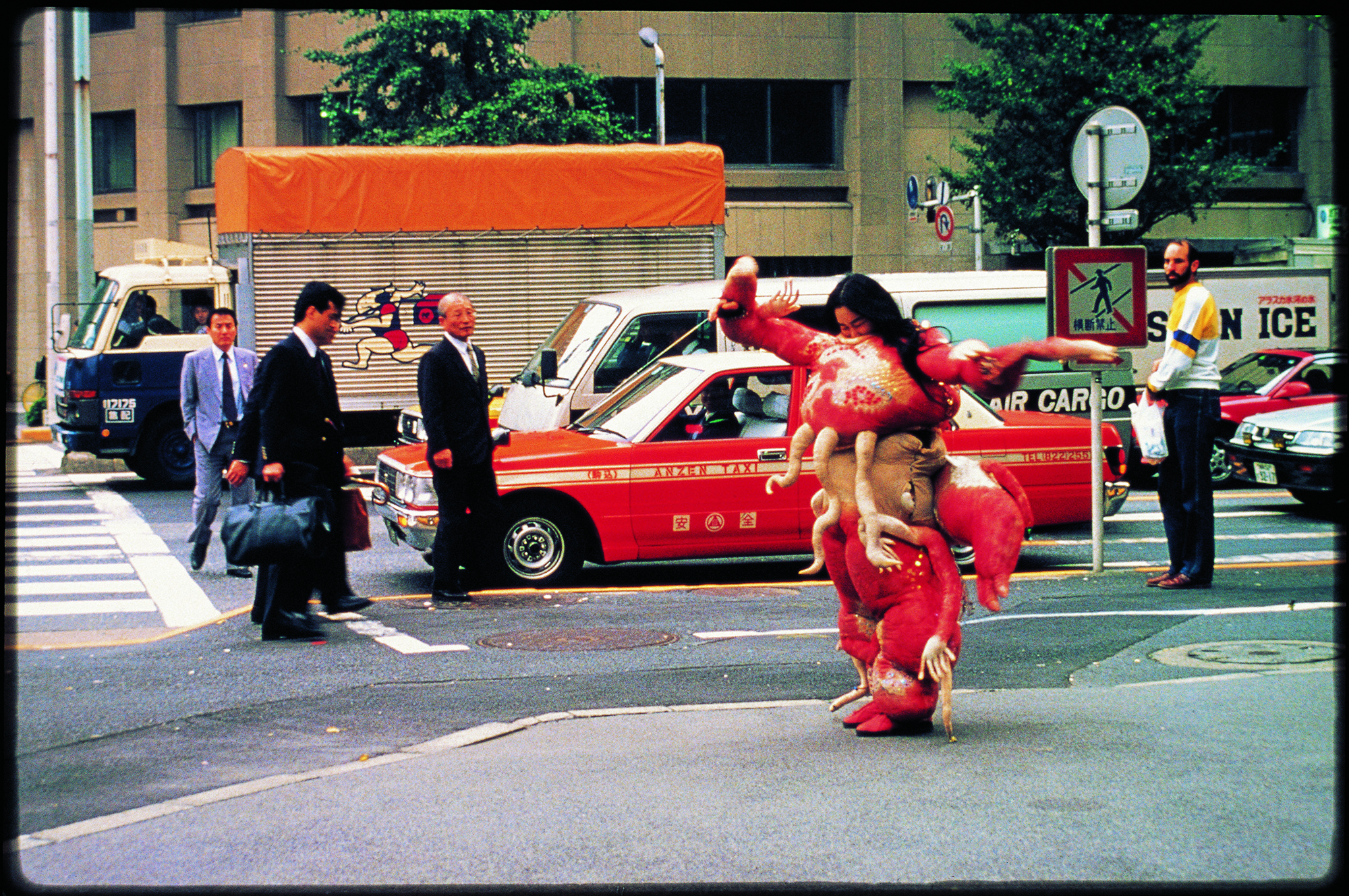 Lee Bul, Sorry for Suffering—You Think I’m a Puppy on a Picnic?, 1990, Performance, 12 days, The 2nd Japan and Korea Performance Festival, Gimpo Airport, Korea; Narita Airport, Meiji Shrine, Harajuku, Otemachi Station, Koganji Temple, Asakusa, Shibuya, University of Tokyo and Tokiwaza Theater, Tokyo, Japan. Courtesy of the artist.